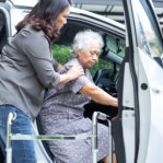 woman helping the grandmother